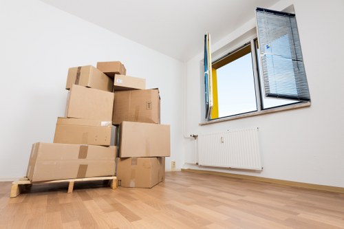 Crew removing bulky household furniture during a Waterloo pick-up