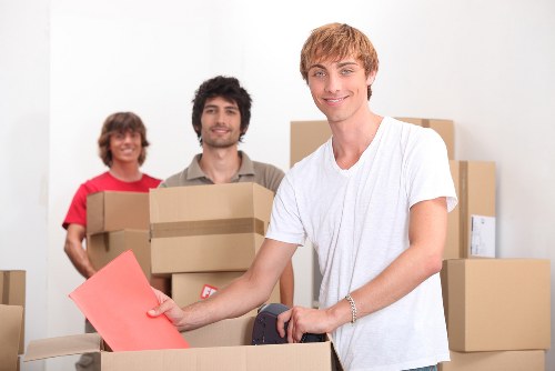 Business relocation team handling desks and workstations for a Waterloo office move